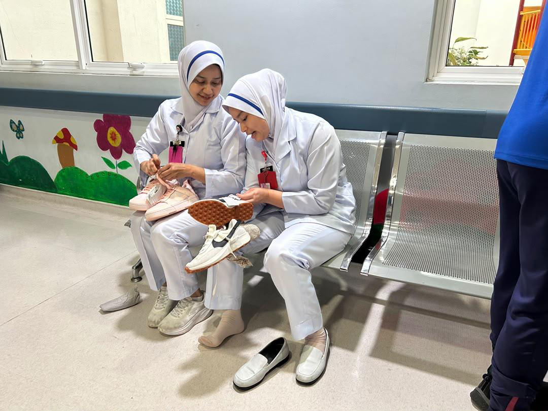 Nike Shoe Distribution to Hospital Staff and Child Patients - Photo 8
