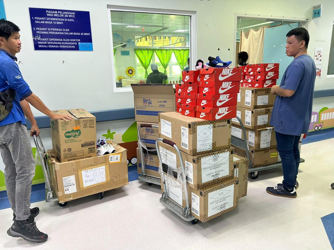 Nike Shoe Distribution to Hospital Staff and Child Patients - Photo 13