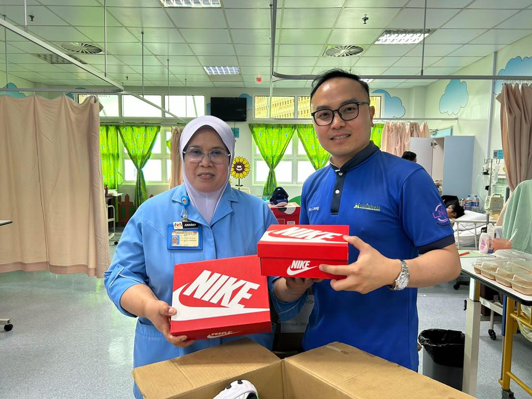 Nike Shoe Distribution to Hospital Staff and Child Patients - Photo 14