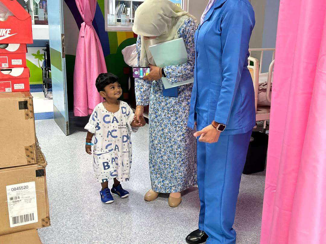 Nike Shoe Distribution to Hospital Staff and Child Patients - Photo 21
