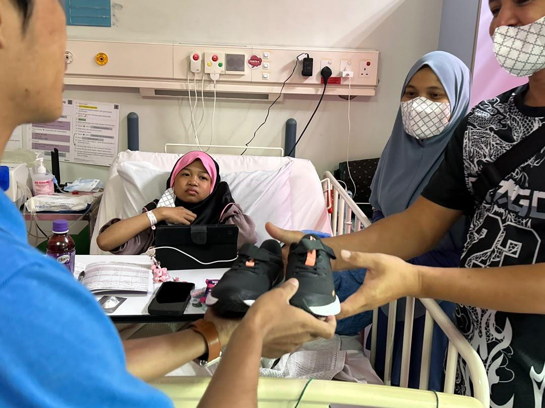 Nike Shoe Distribution to Hospital Staff and Child Patients - Photo 23