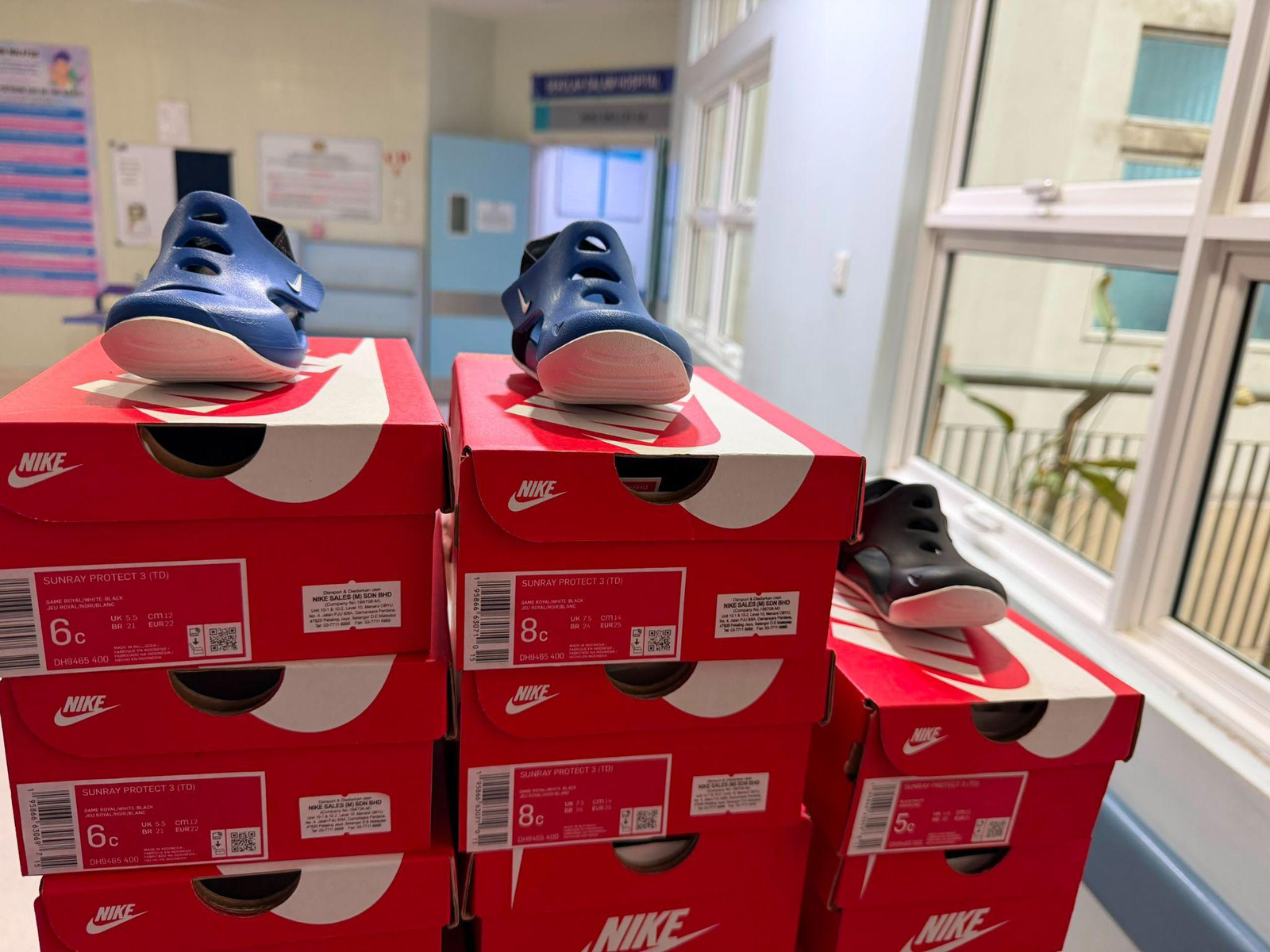 Nike Shoe Distribution to Hospital Staff and Child Patients - Photo 24